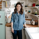 Molly Yeh standing in her kitchen